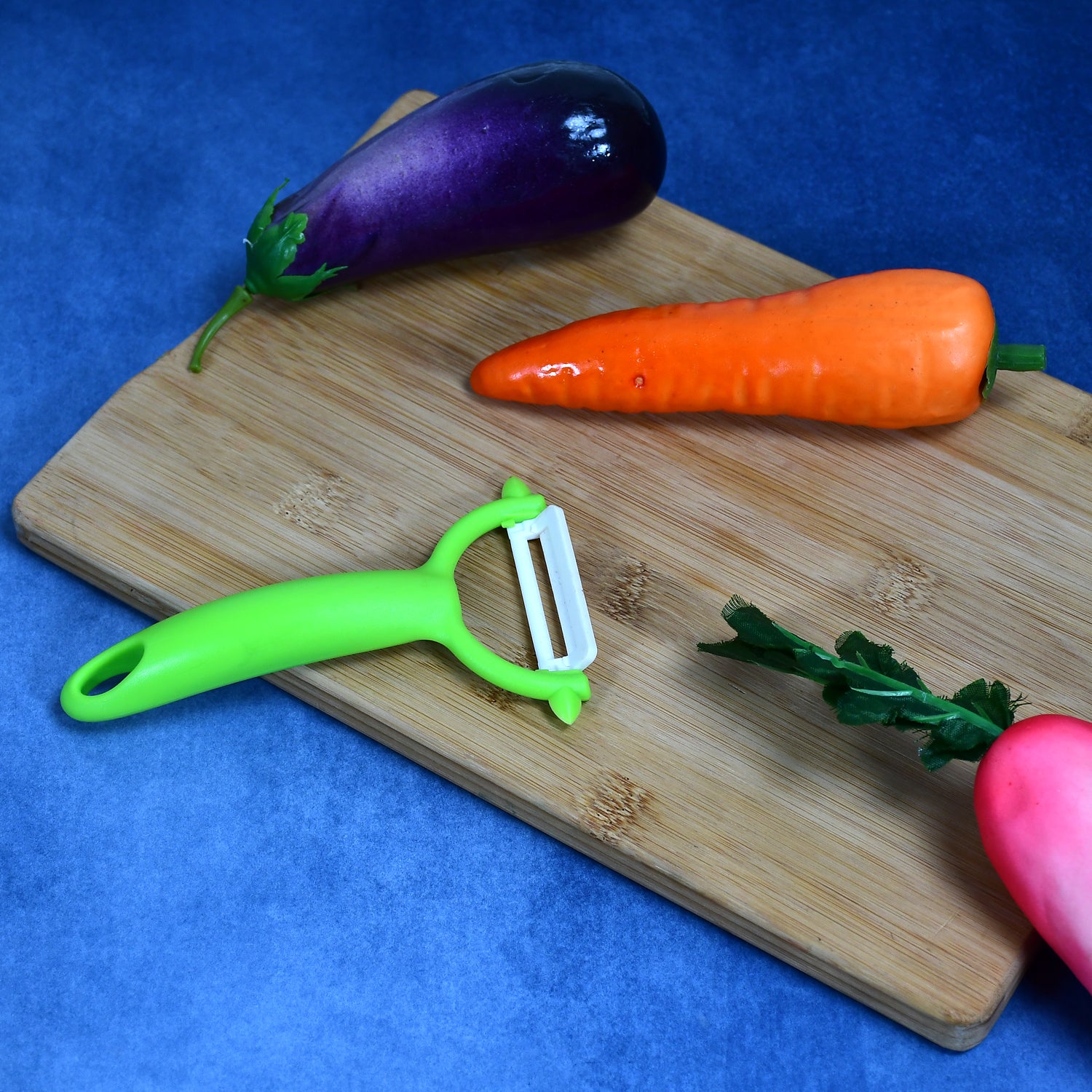 A hand demonstrating the precise slicing of vegetables using the ceramic utility knife.