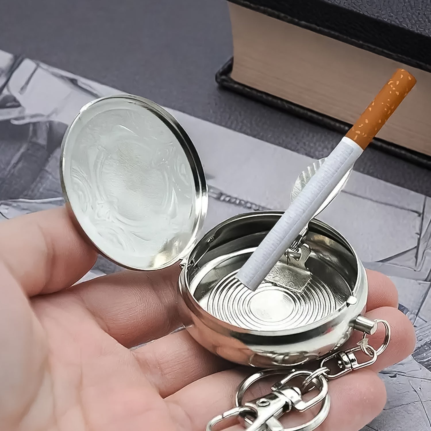 Steel pocket ashtray keyring with secure lid
