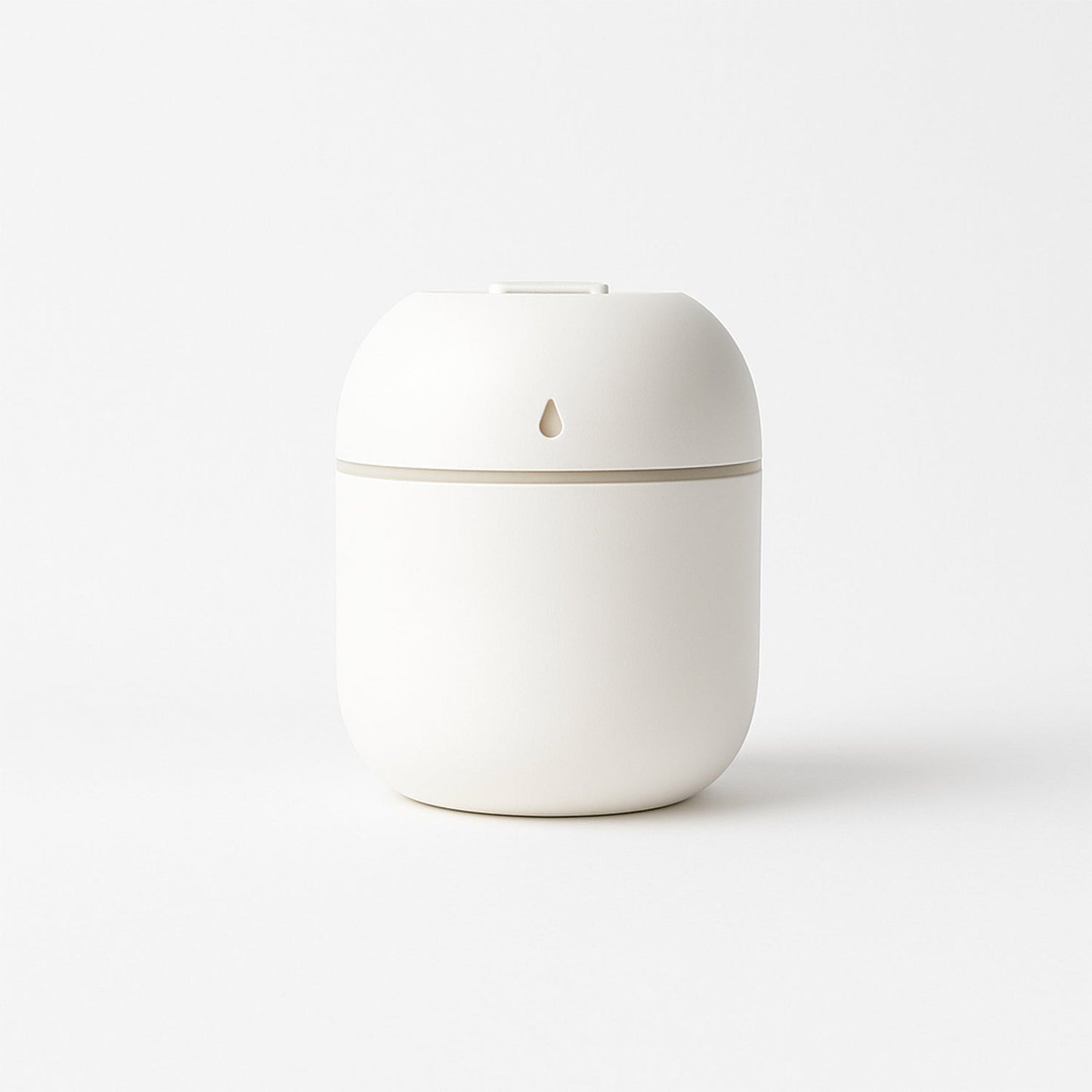 Mini USB Humidifier releasing a visible cool mist plume.
