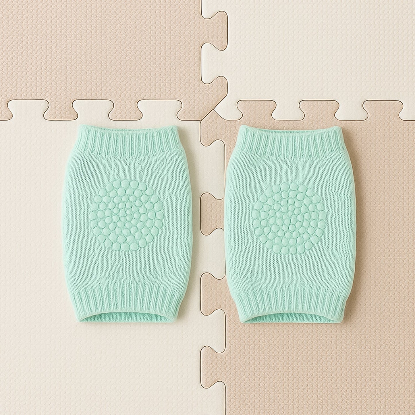 Close-up of soft mint green wool toddler knee protector leg warmers