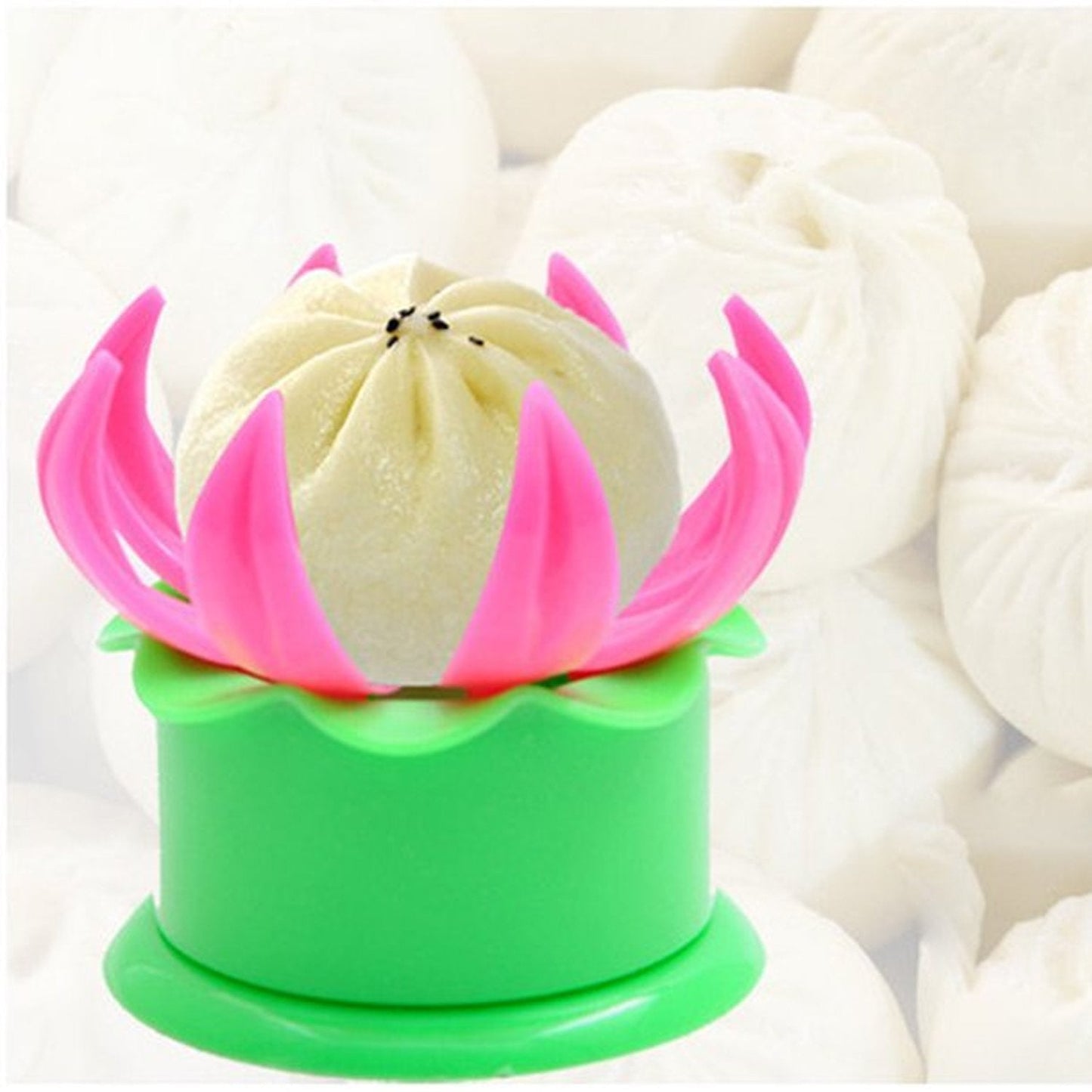 Momos maker mold in green and pink, used for shaping homemade dumplings.