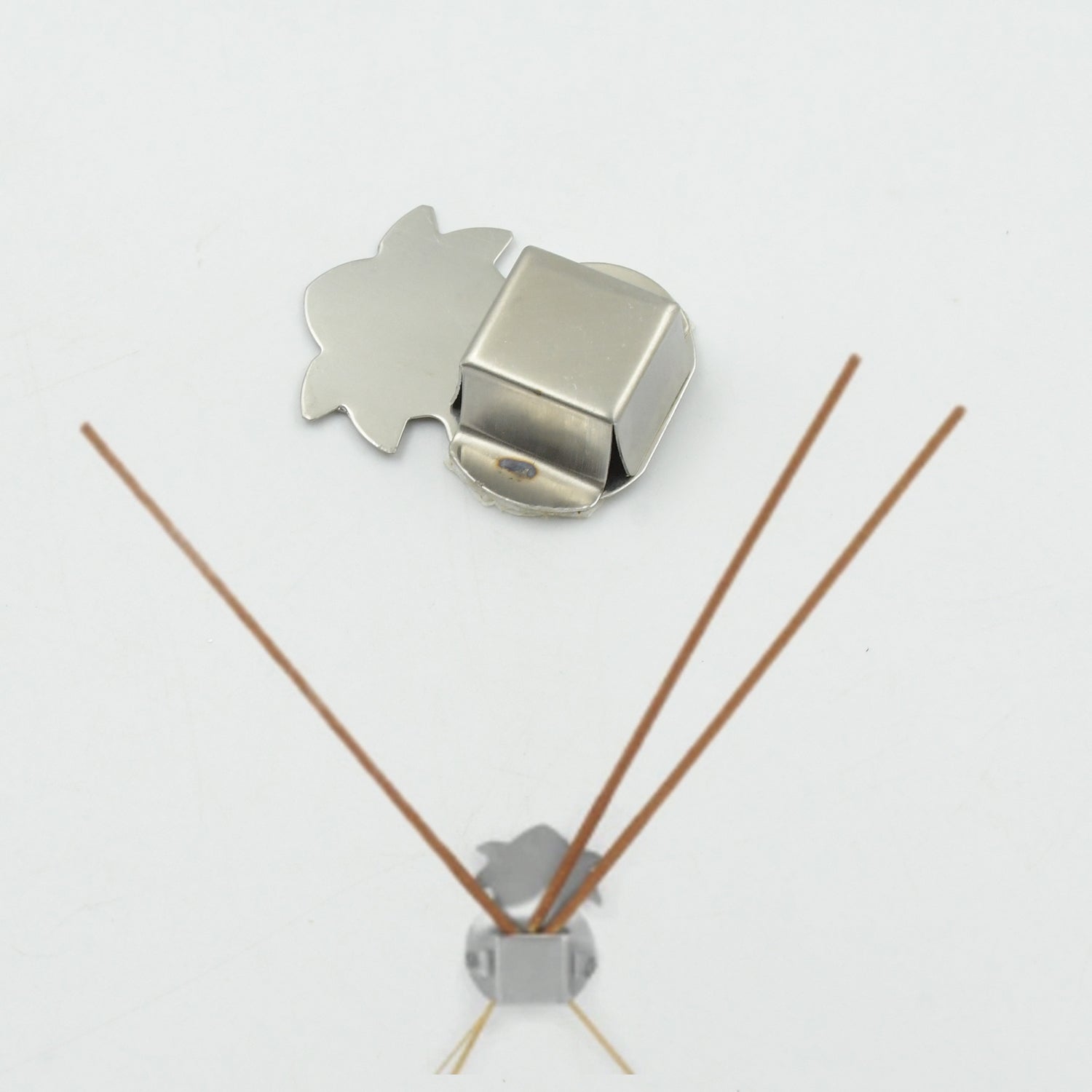 Complete pack of 12 self-adhesive stainless steel agarbatti stands.