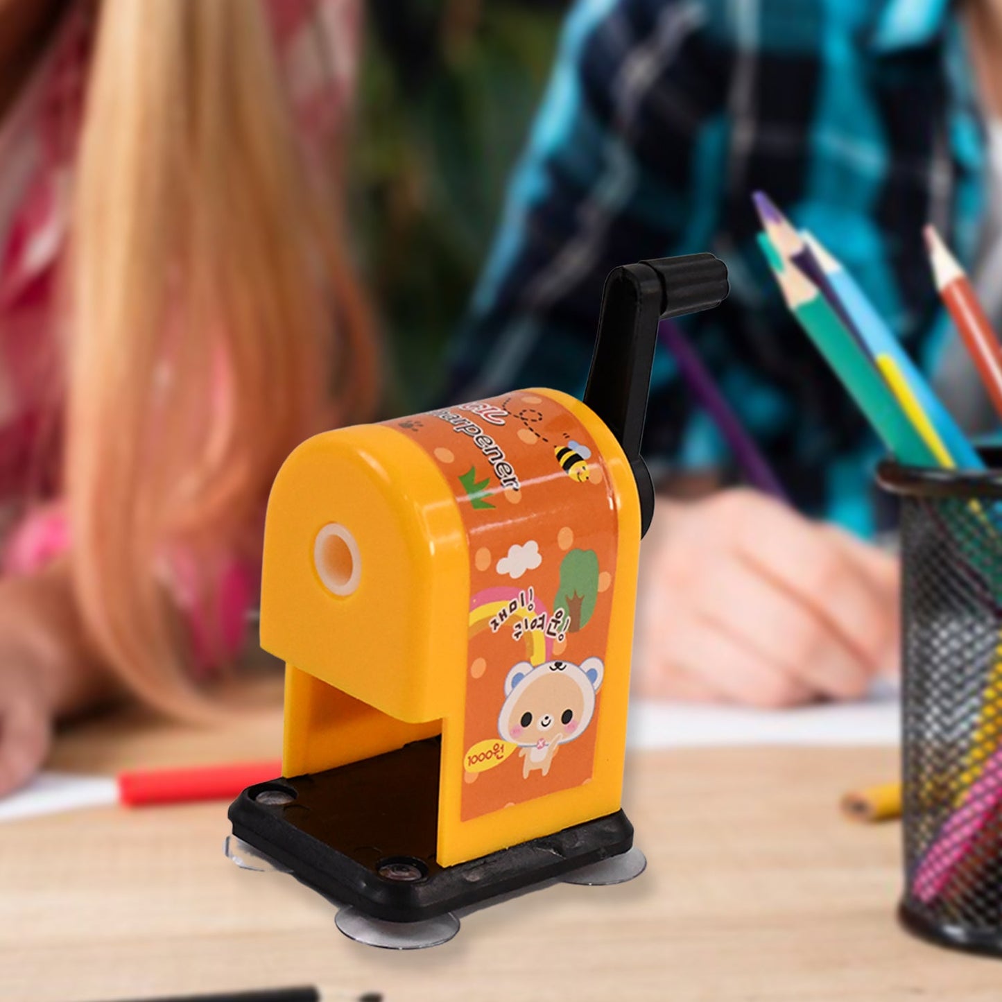 Side view of the table pencil sharpener with a secure front cover lock