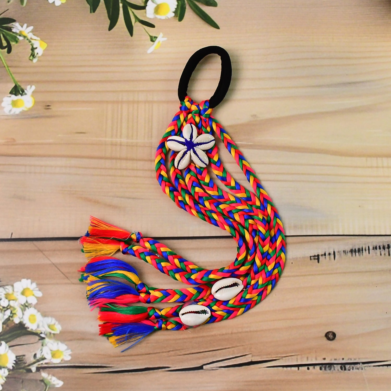Festive braided hair accessory with elastic band and colorful tassels