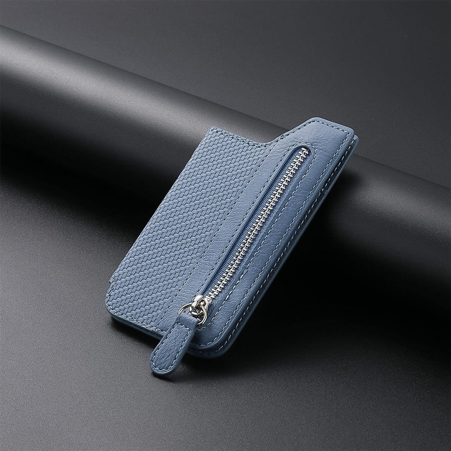 Rear view of a smartphone with the adhesive card phone holder attached.