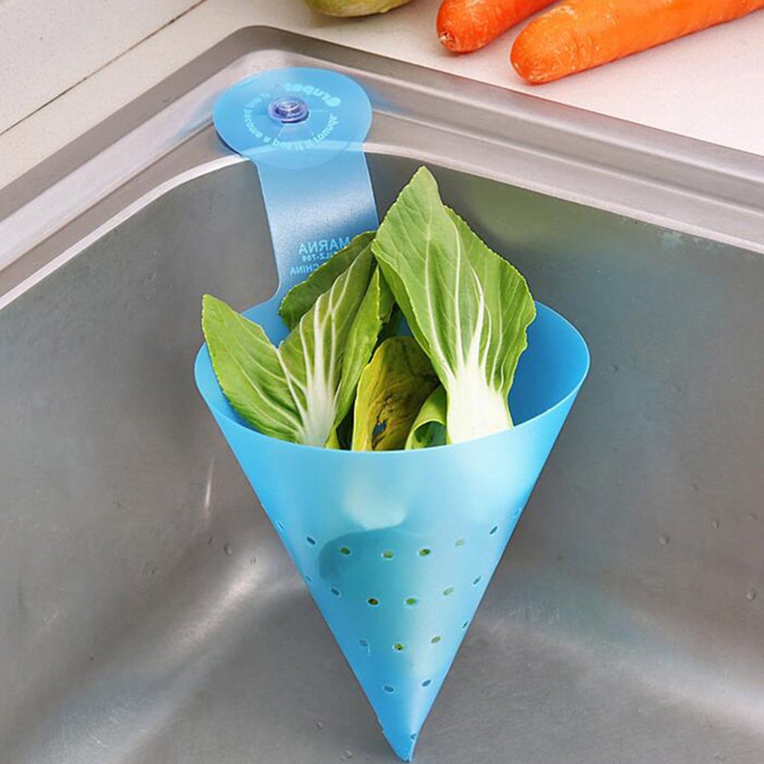 Side view of triangular hanging sink strainer with suction cup attachment