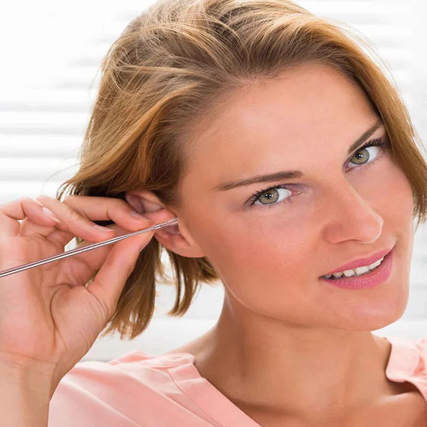 Close-up of stainless steel ear cleaning tools for precise earwax removal