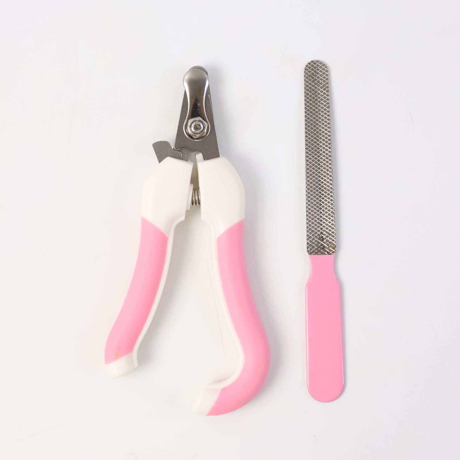 Pet grooming accessory showing pet nail clipper and nail file set