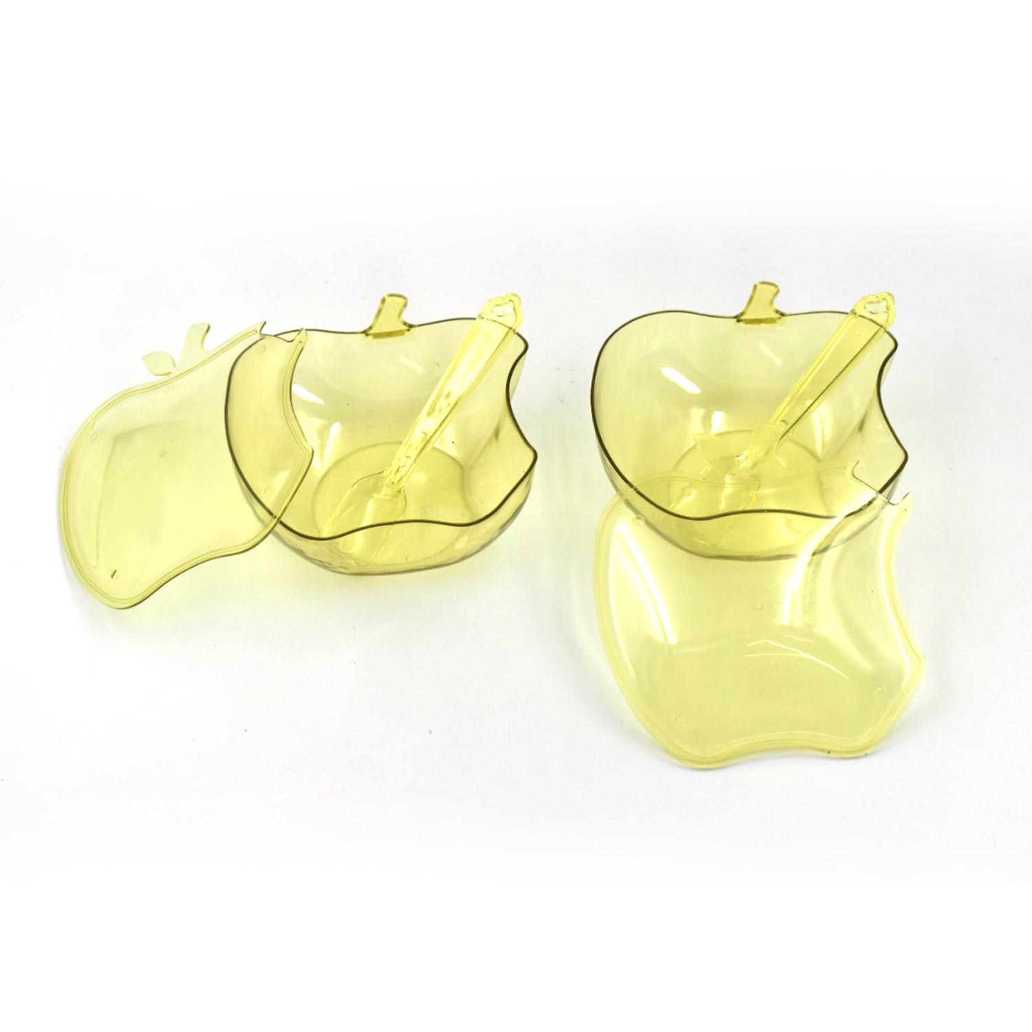 Snack serving apple-shaped bowl with dry fruits.
