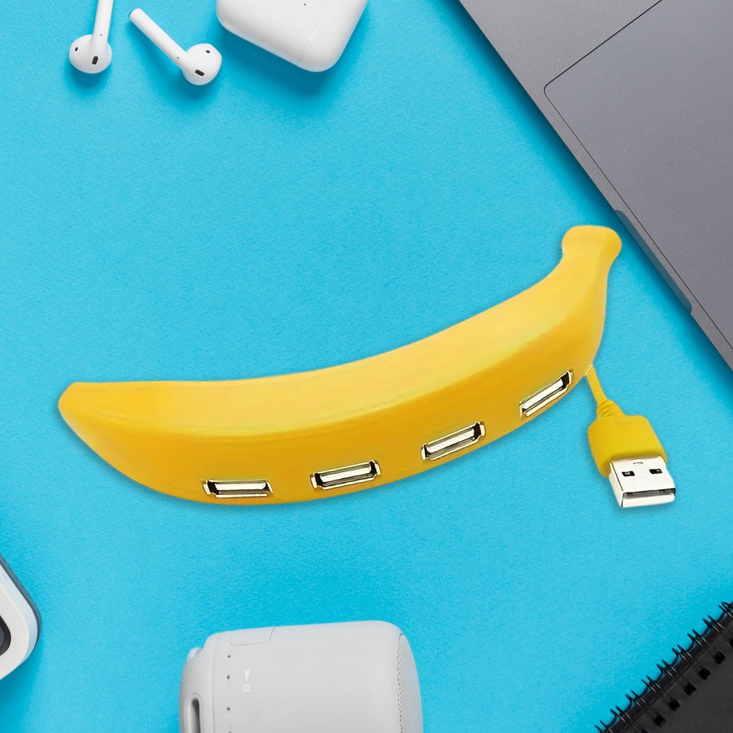 Wiregenix Banana Shape USB Hub in use with a laptop, expanding available ports easily.