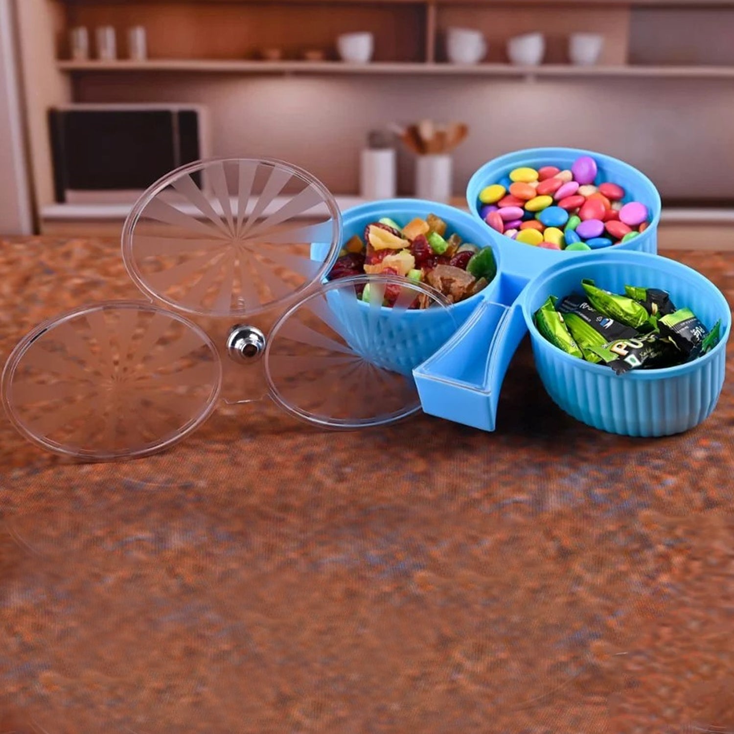 Rotating snack box with three sections for dry fruits and candies