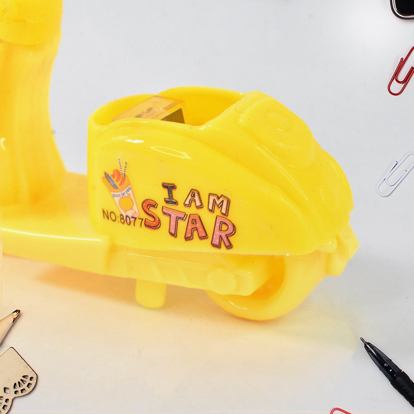 Bike shaped pencil sharpener showing pedal details and durable build
