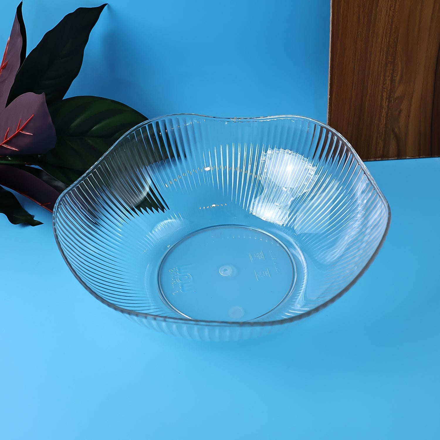 Plastic fruit basket placed on dining table