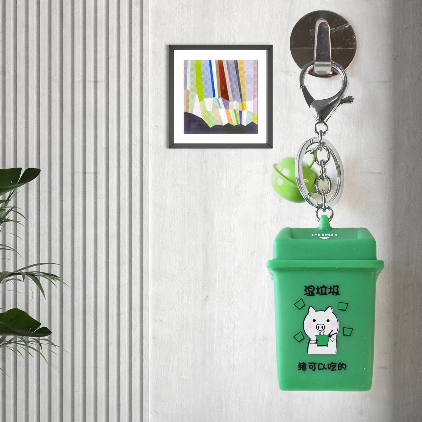 Side view of Trash Can Keychain showing compact and functional design