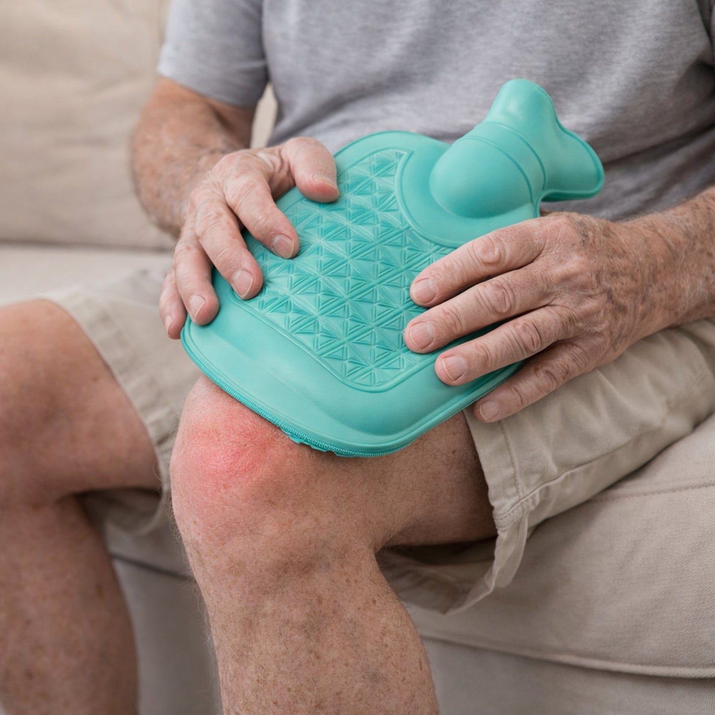 Durable rubber hot water pack providing consistent heat for pain relief