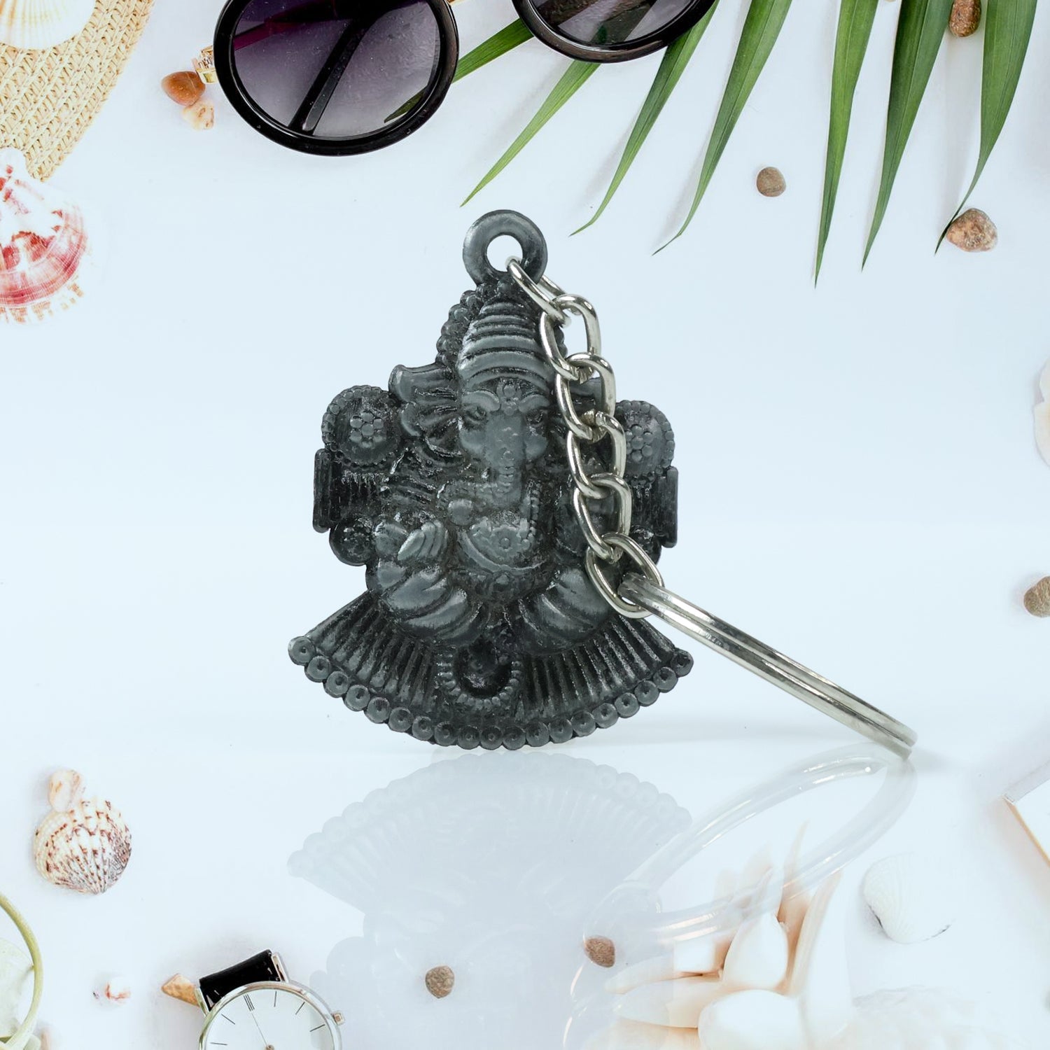 Back view of silver Lord Ganesha keychain showing metal finish