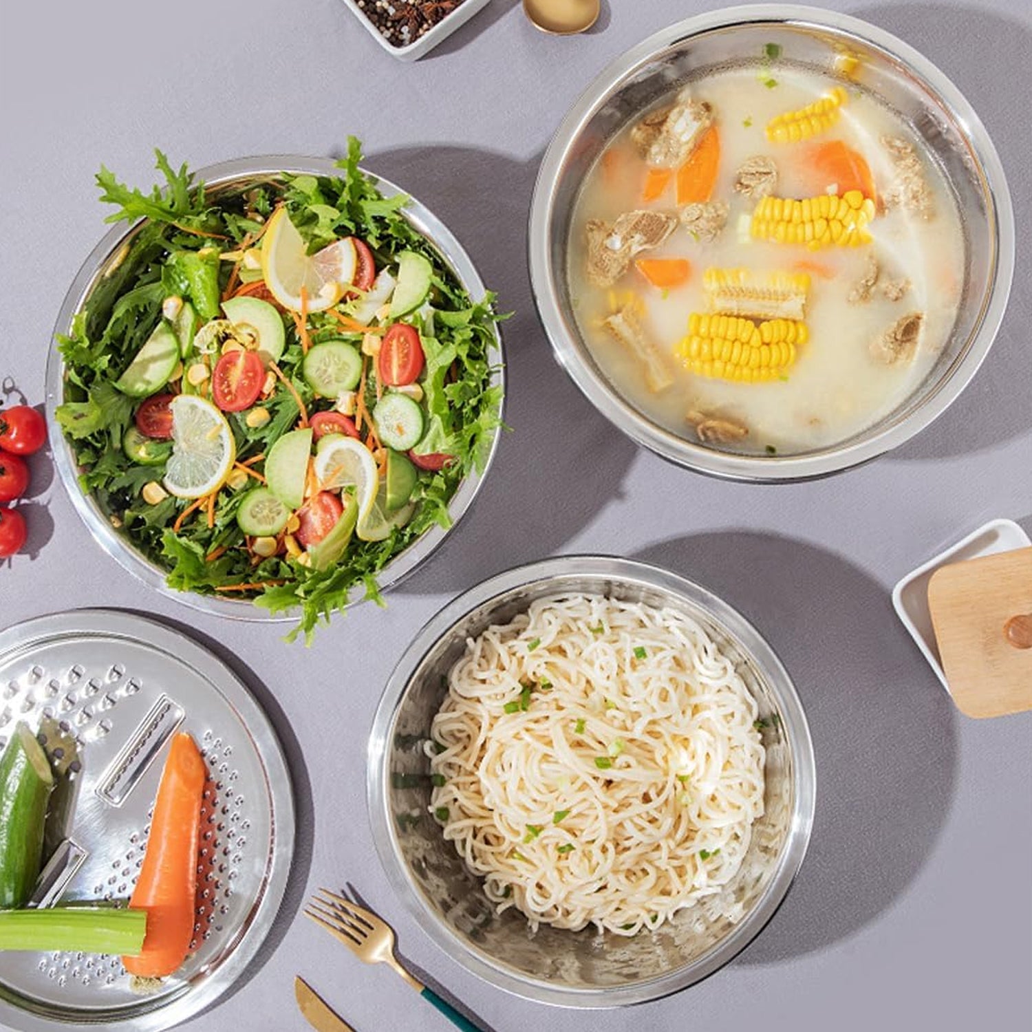 Stainless steel multifunction kitchen bowl set arranged for storage