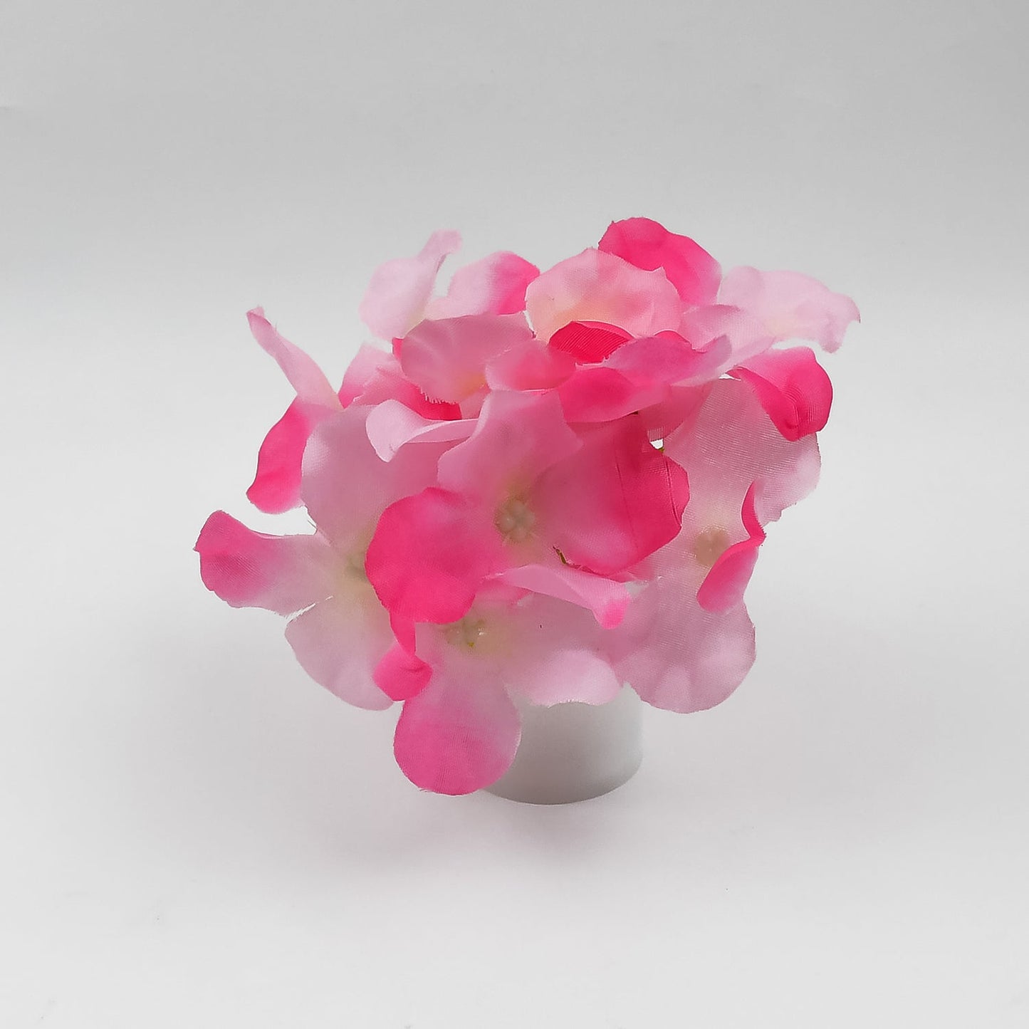 Decorative LED light featuring a realistic flower design, perfect for enhancing home ambiance.
