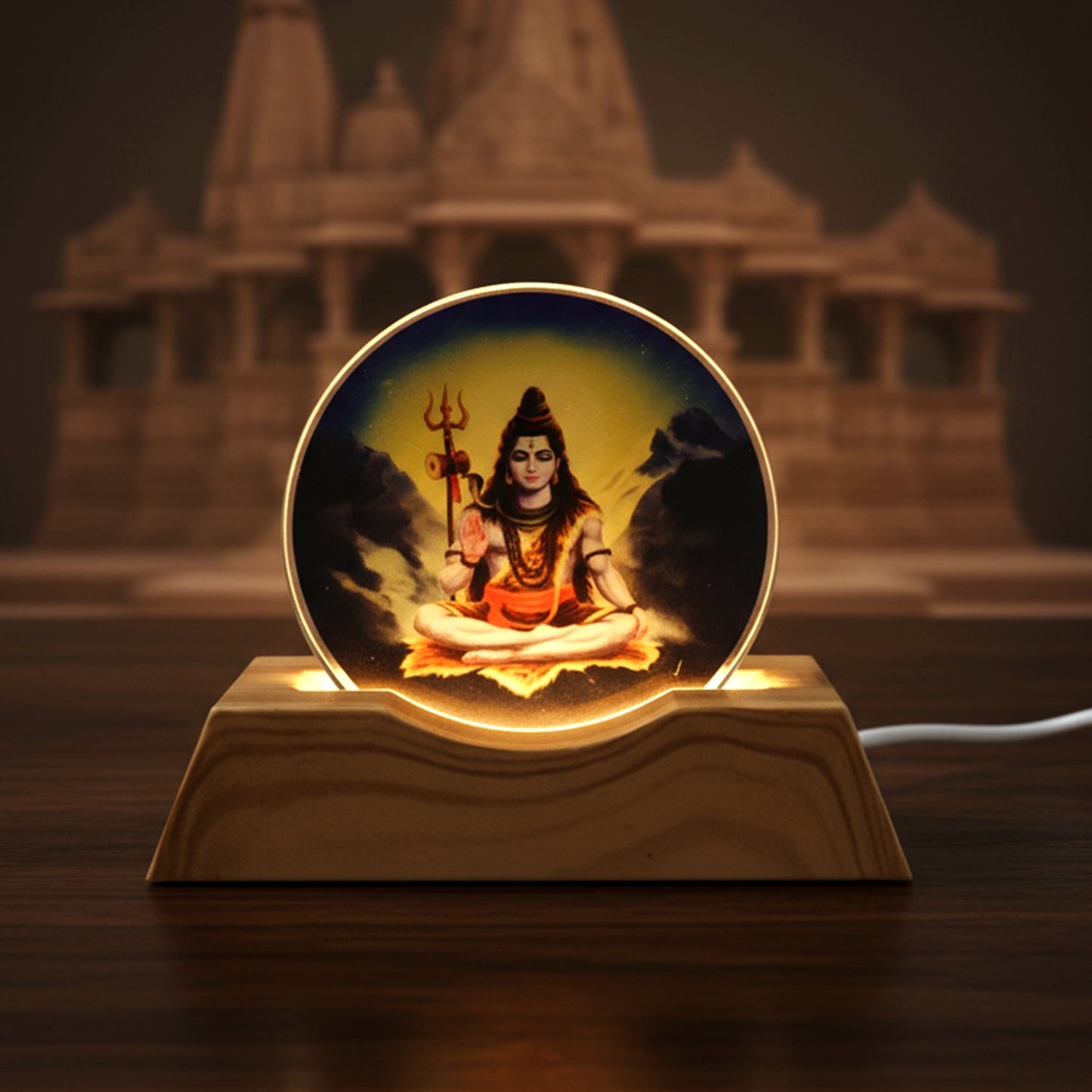 Soft warm glow of Lord Shiva LED night light illuminating bedroom corner