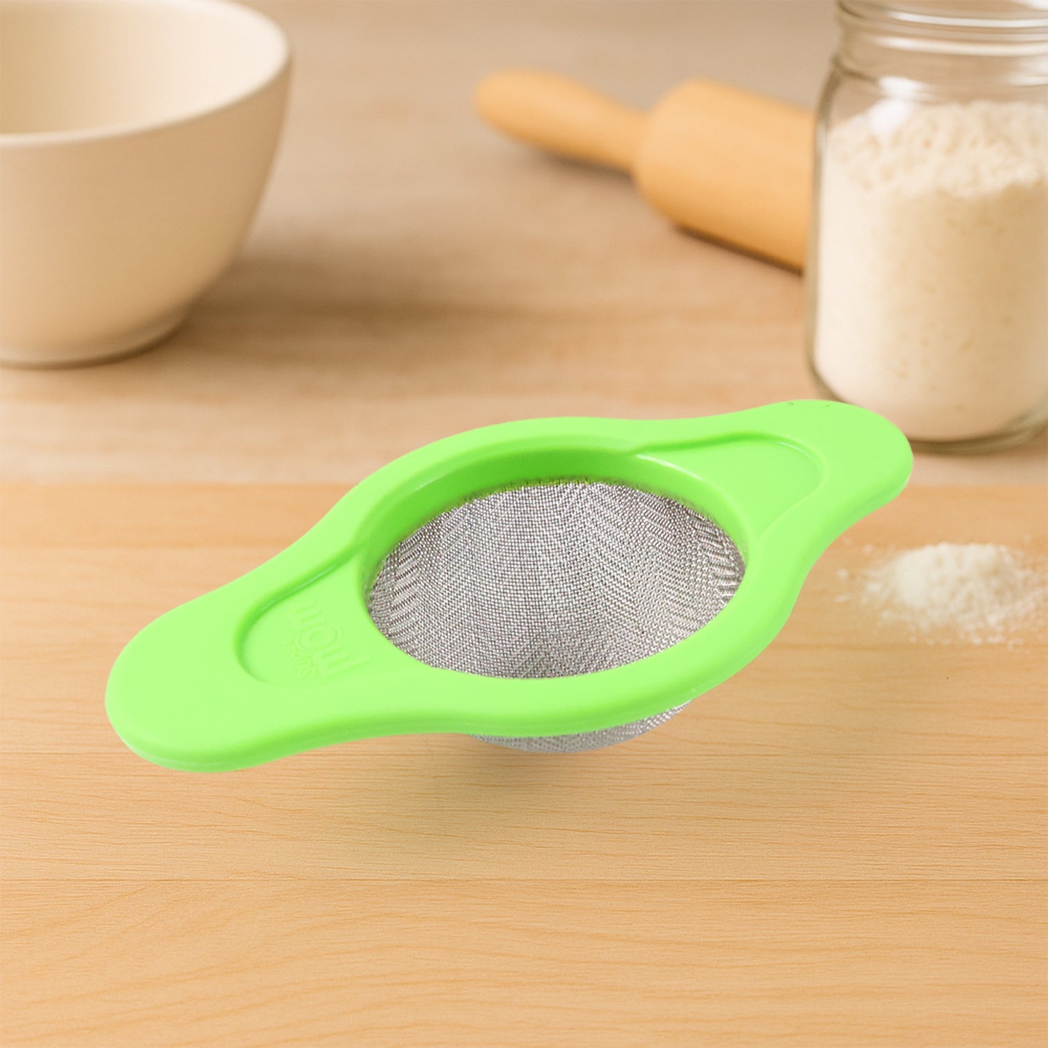 Stainless steel mesh strainer with dual plastic handles for easy kitchen use