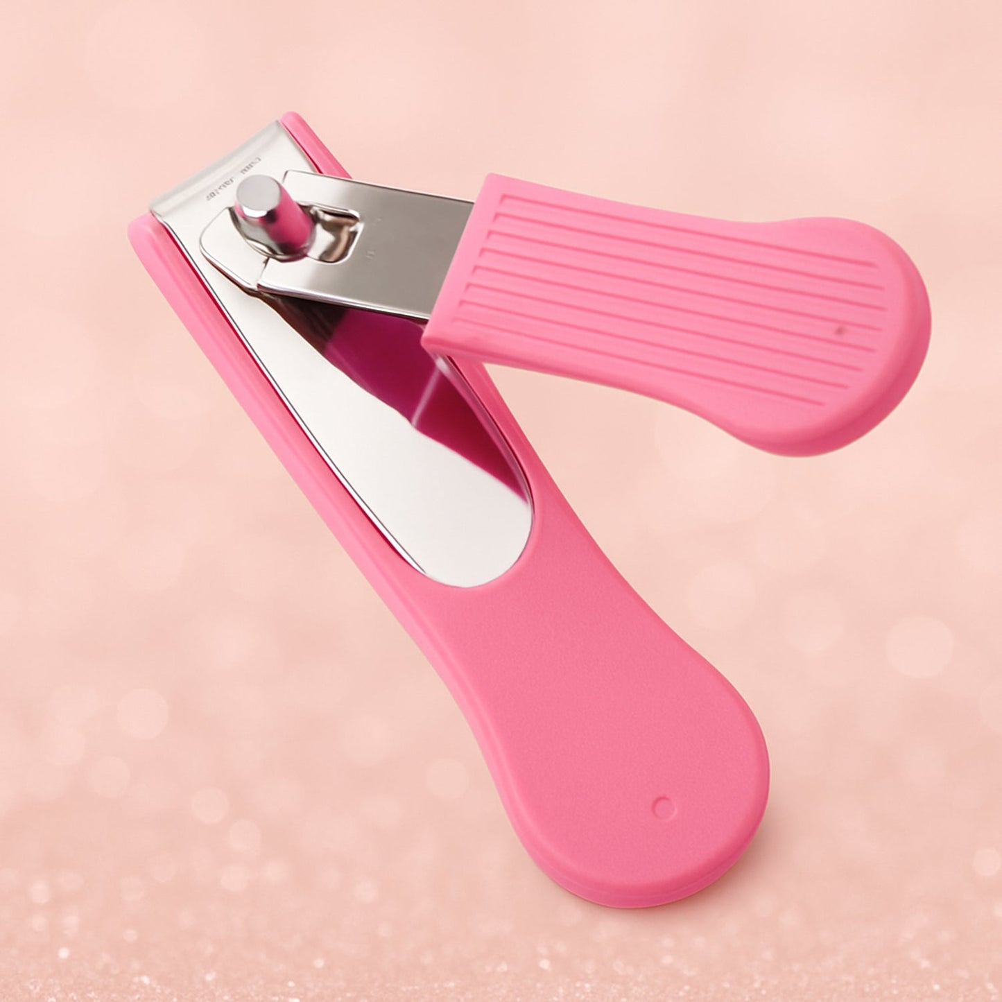 Close-up of ergonomic lever on AuriGlam nail cutter for comfortable grip