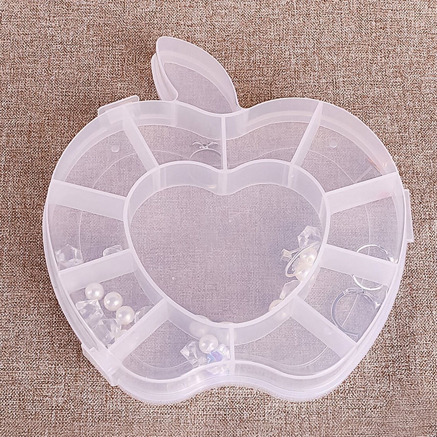 Apple-shaped jewellery storage box open view showing compartments