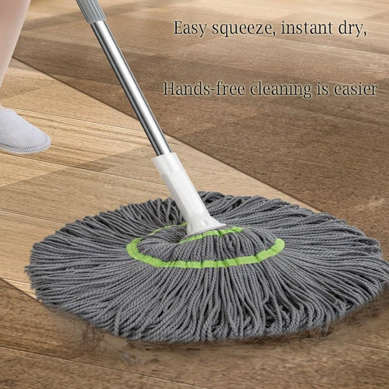 Self wringing cleaning mop with microfiber head and stainless steel handle in use