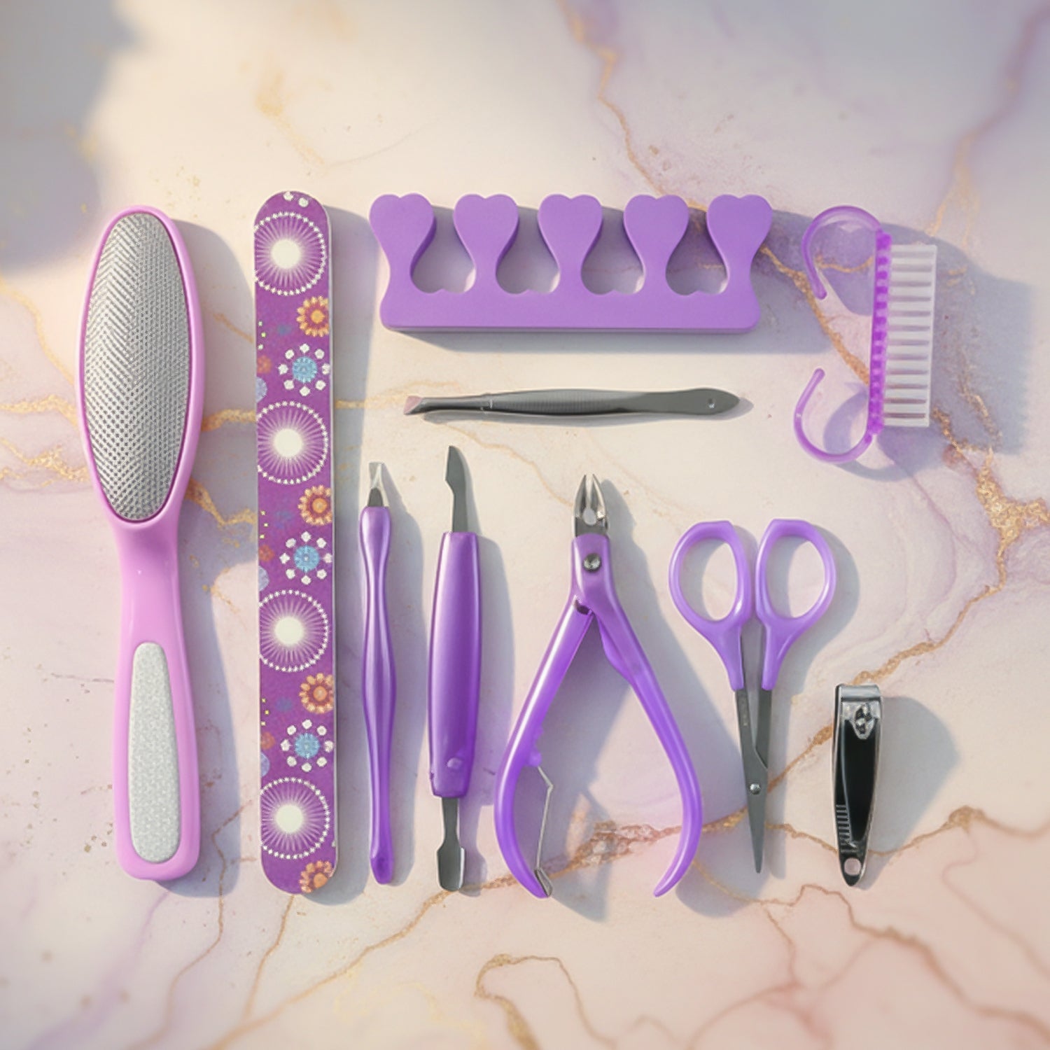 Stainless steel manicure and pedicure tools arranged neatly in the grooming set