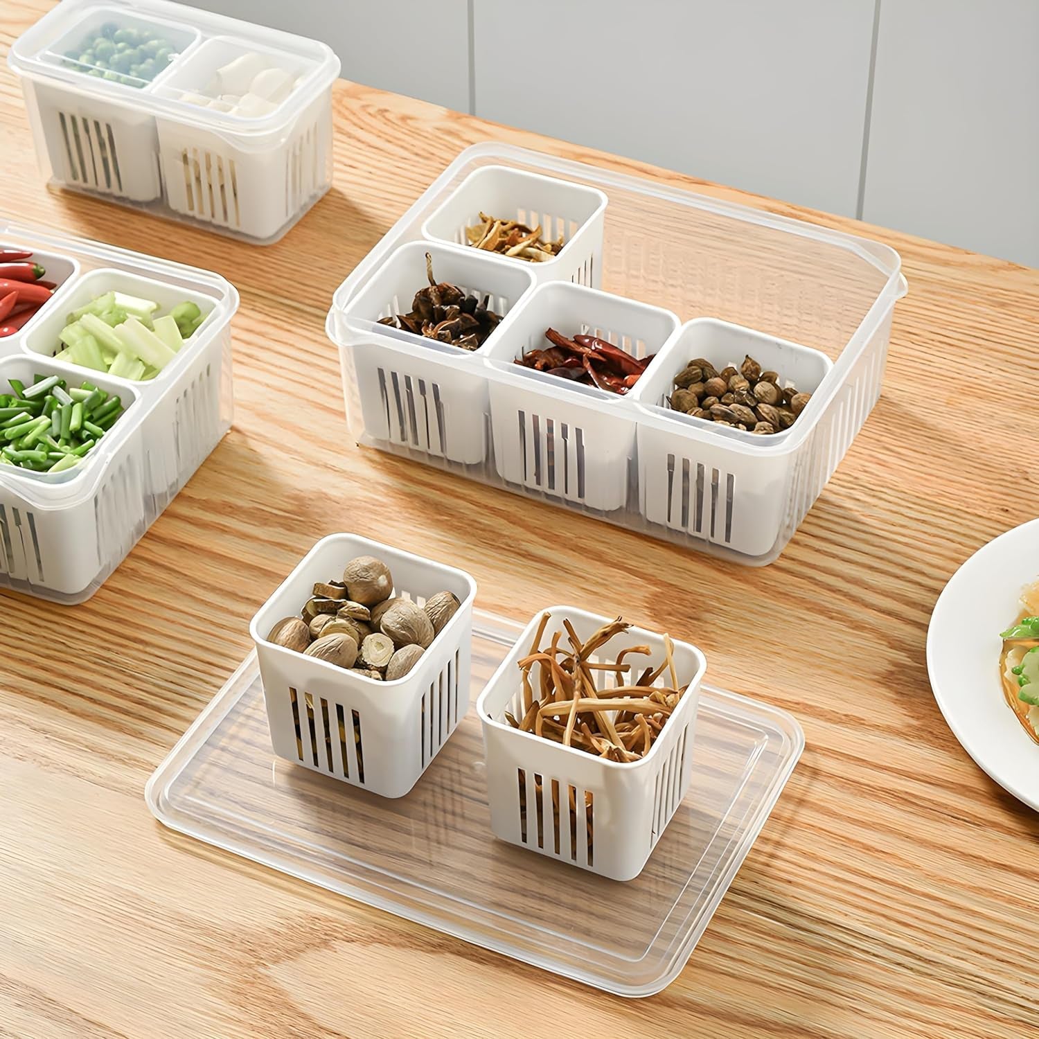 A fridge storage box brimming with fresh, colorful fruits and vegetables.