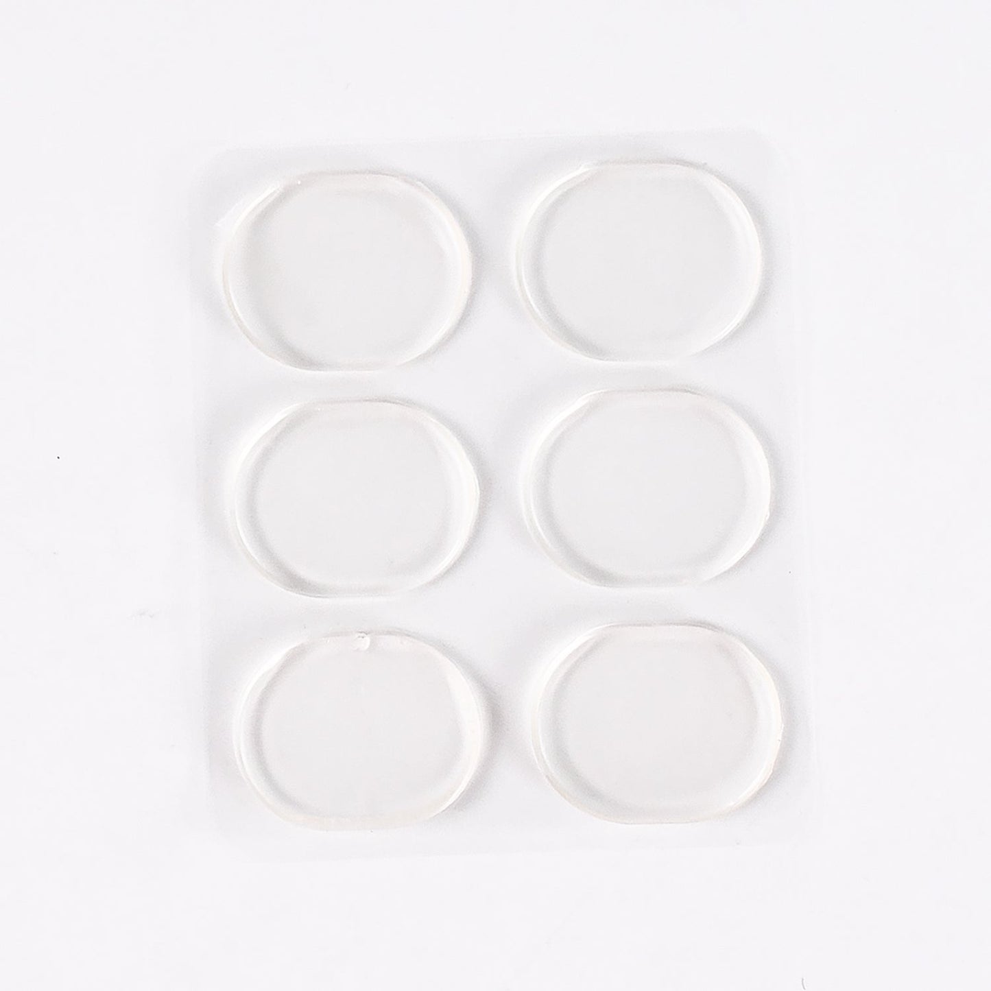 Silicone shoe pads in use inside comfortable footwear cushioning the heel