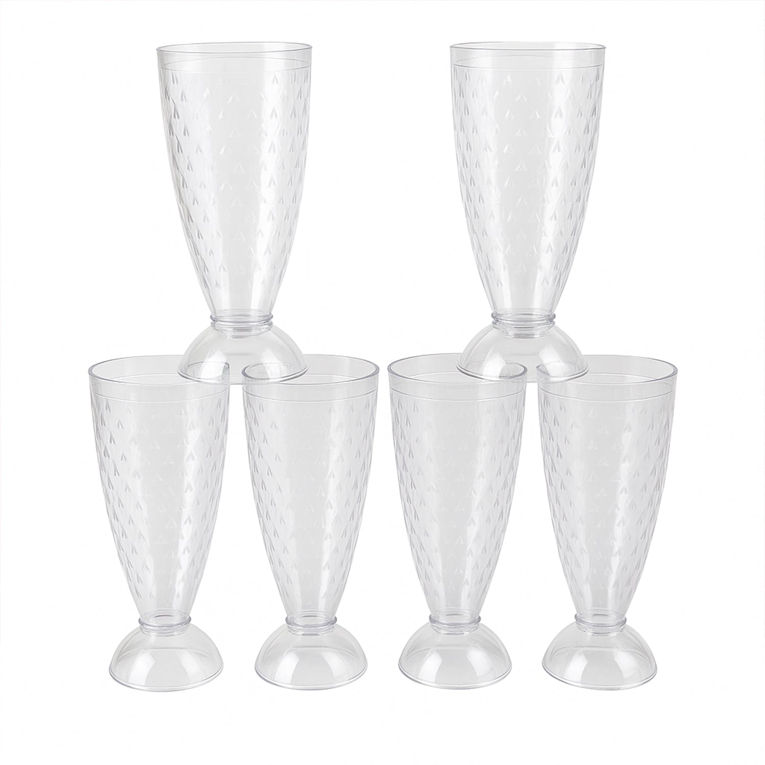 Transparent plastic milkshake glasses neatly arranged on a dining table