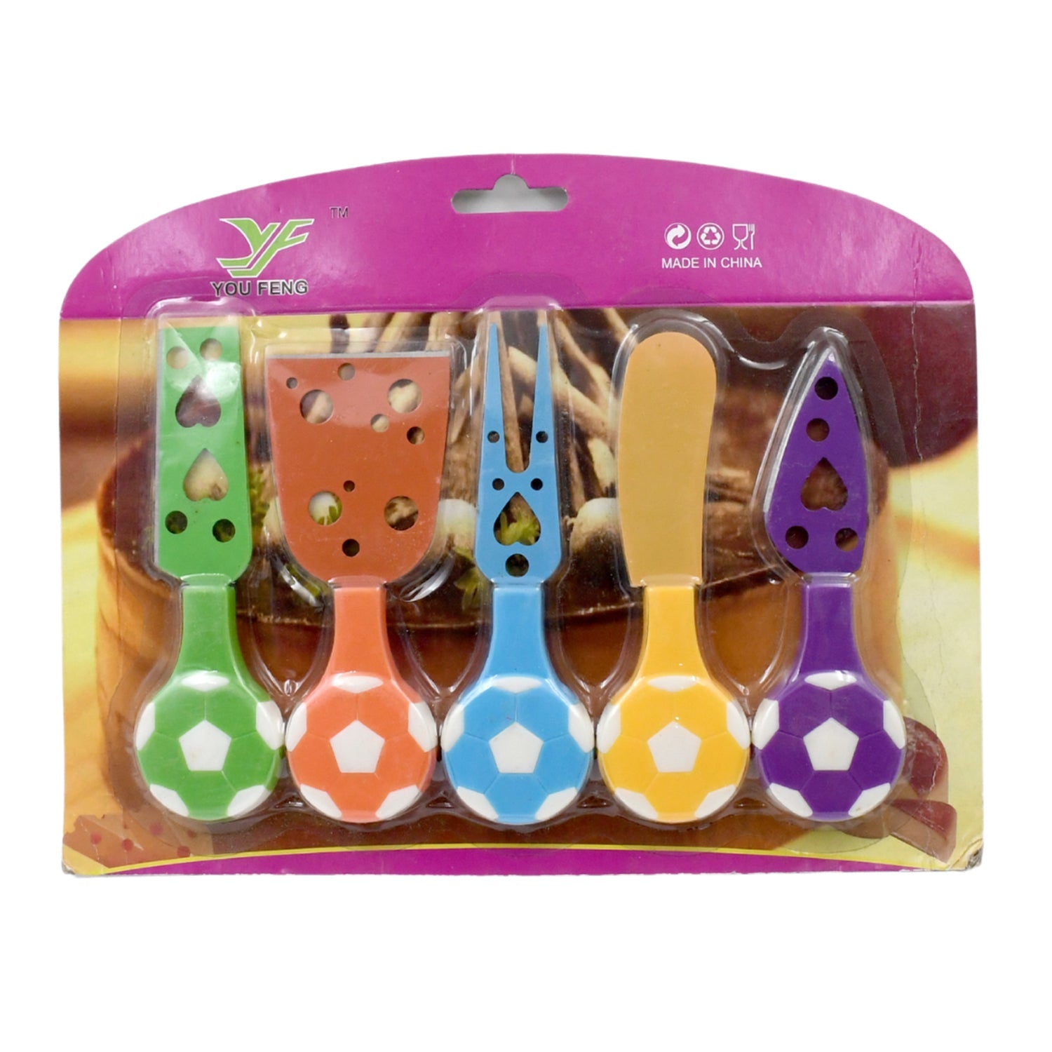 Detailed view of the cheese knife set showcasing soccer ball handles.