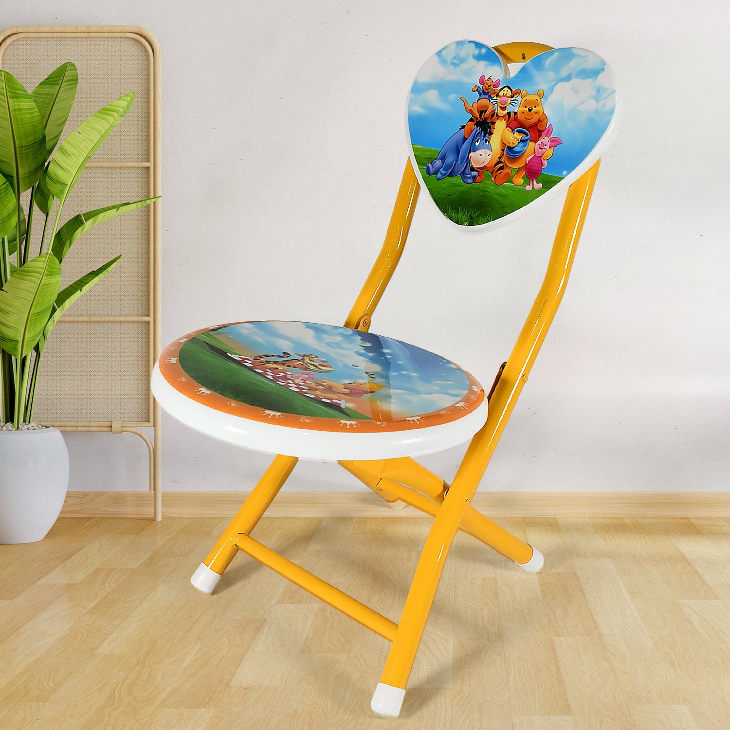 Close-up view of the vibrant heart cartoon print and durable fibre material on the kids chair.