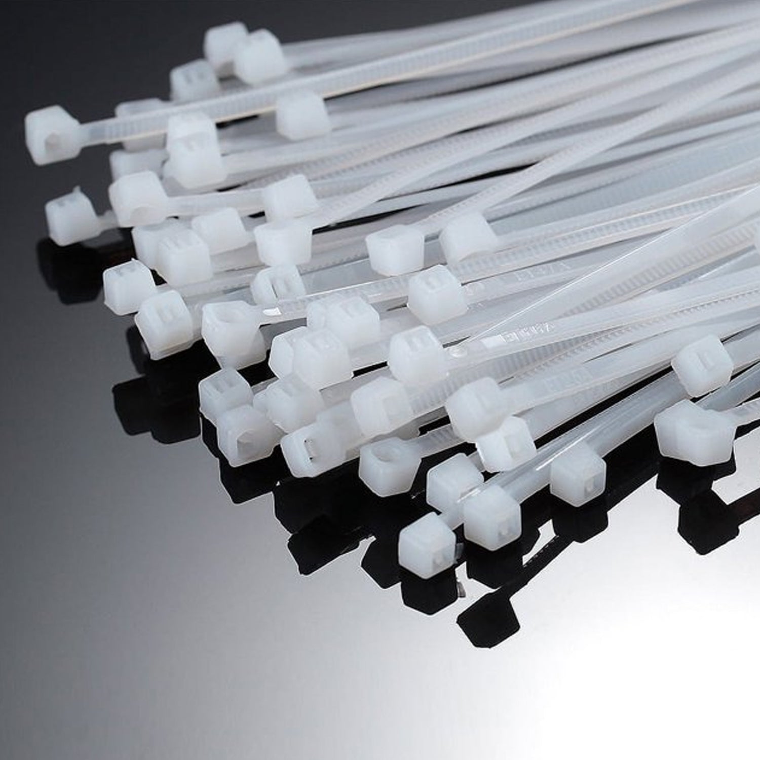 Bundle of strong 6-inch black nylon cable ties ready for use.