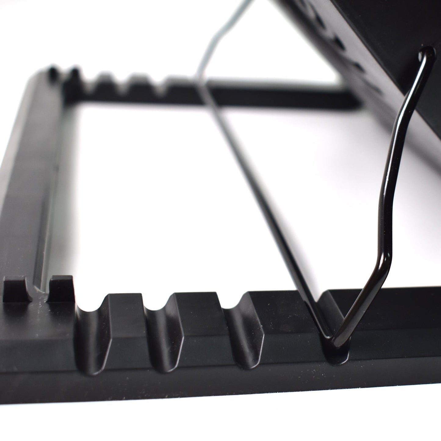 Laptop cooling fan pad with blue LED lights, enhancing the gaming setup.
