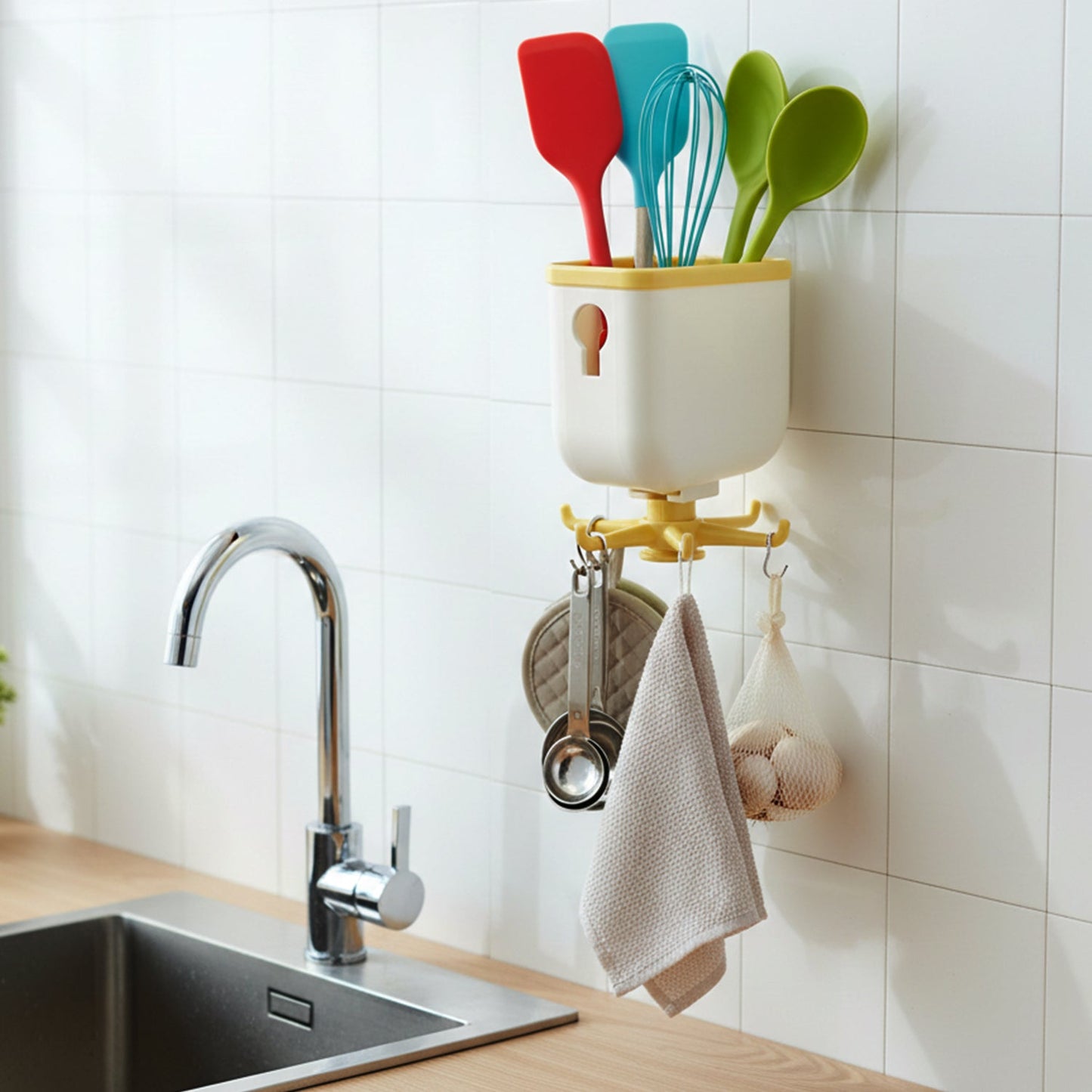 Rotatable sticky wall hook hanging multiple household items securely