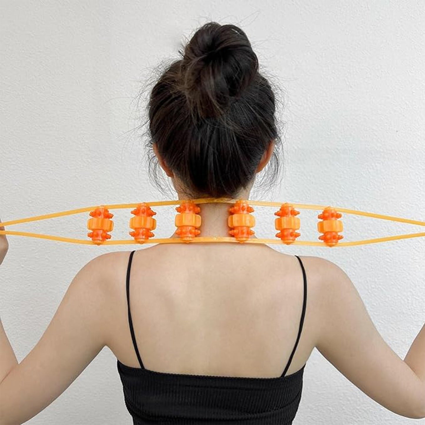 Velvet Wellness handheld back massage roller rope on white background