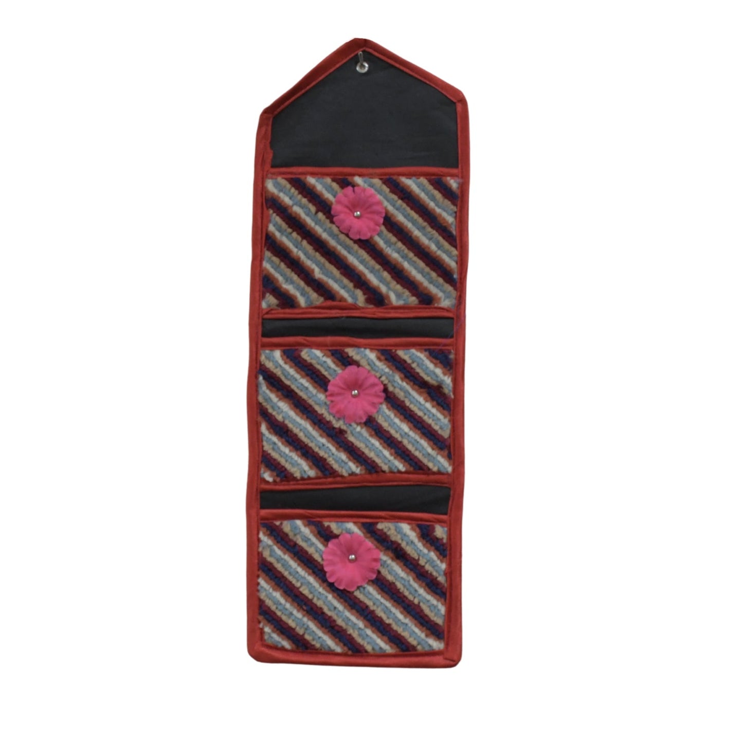 Space-saving foldable hanging organizer providing storage in a modern room.