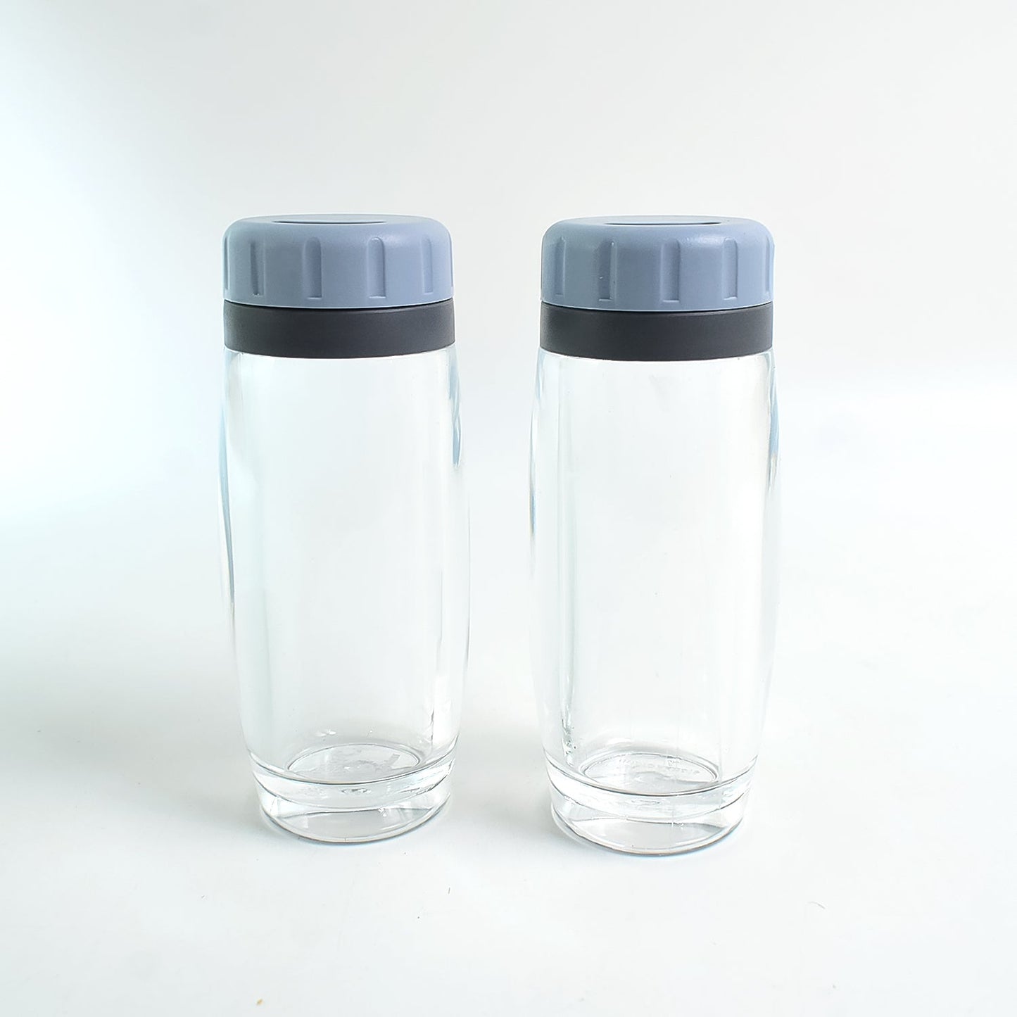 Apex acrylic spice dispensers with ergonomic flip-top lids for easy pouring of salt and pepper