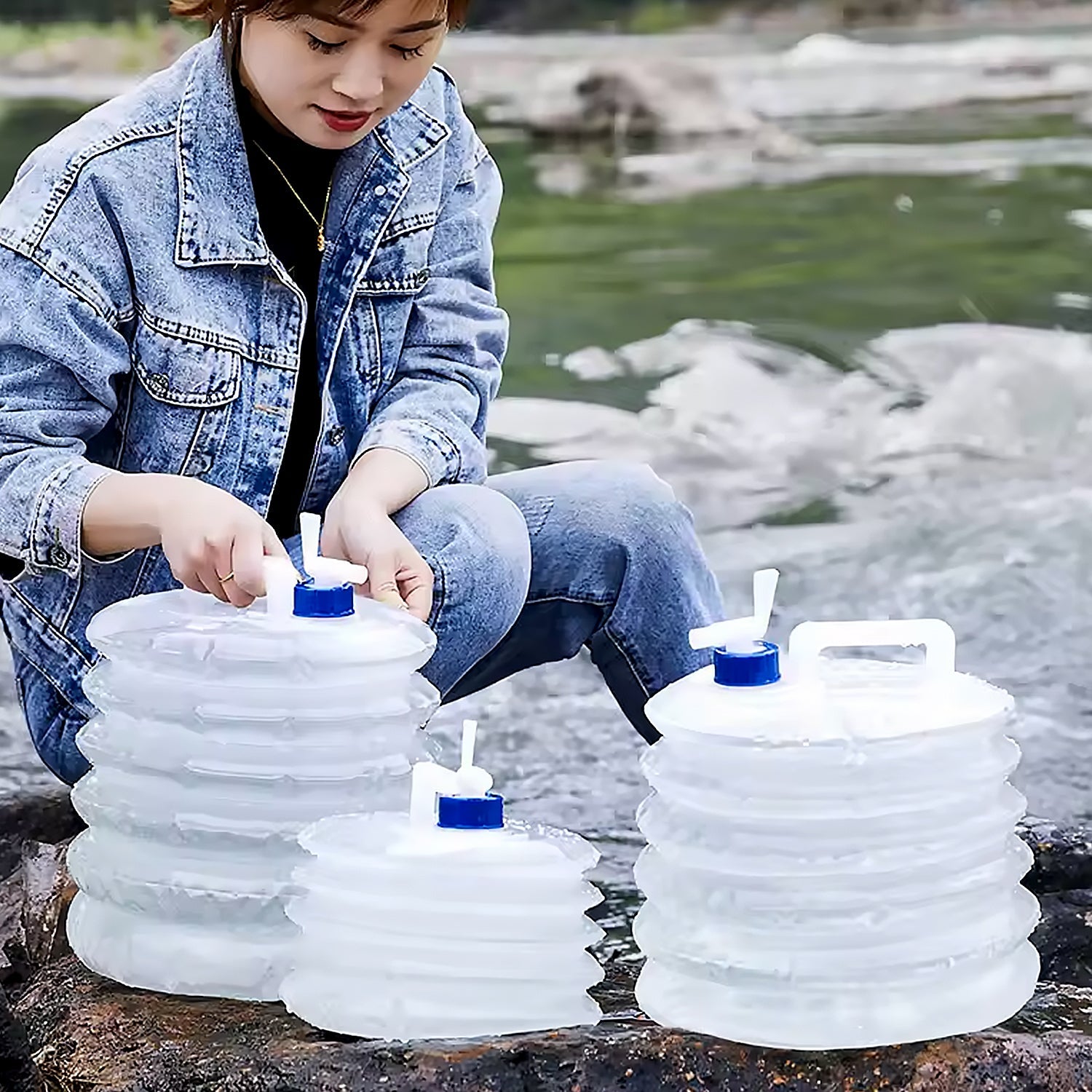 Collapsible water container shown with its secure lid and integrated tap valve.
