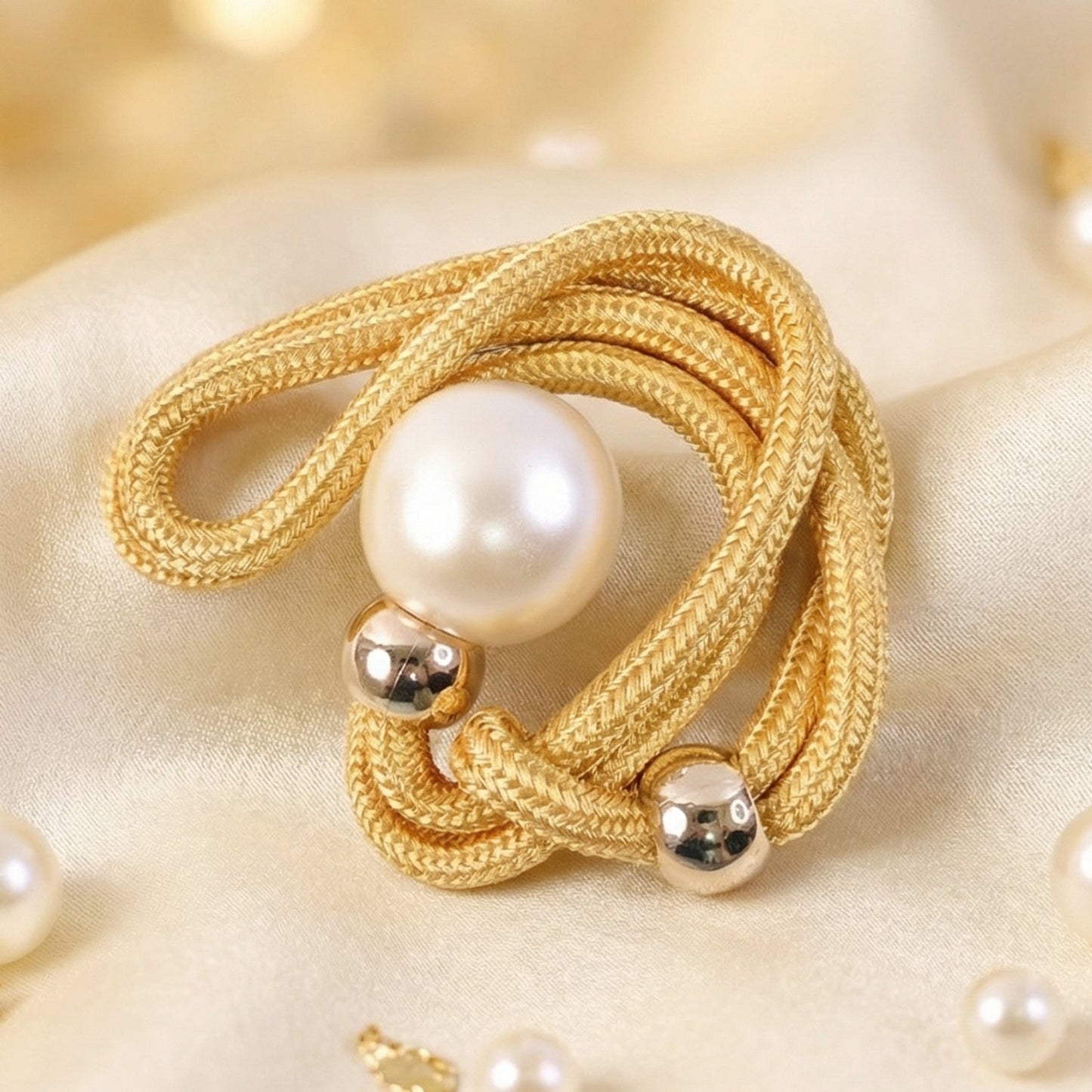 Designer curtain holder strap featuring elegant pearl and rope craftsmanship