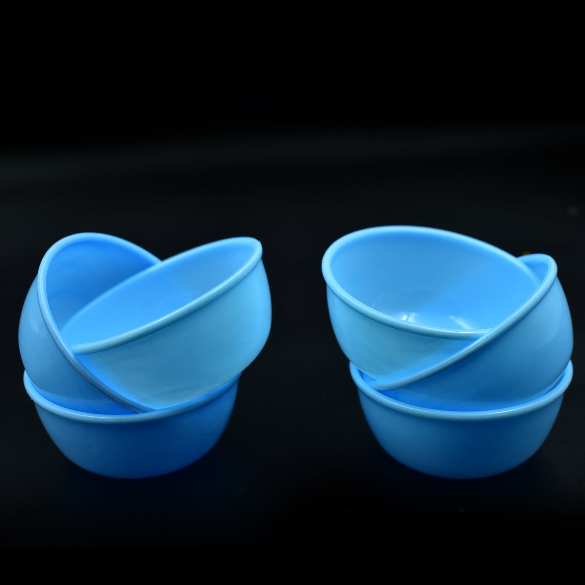Overhead view of microwave-safe unbreakable plastic bowls in a set of six.