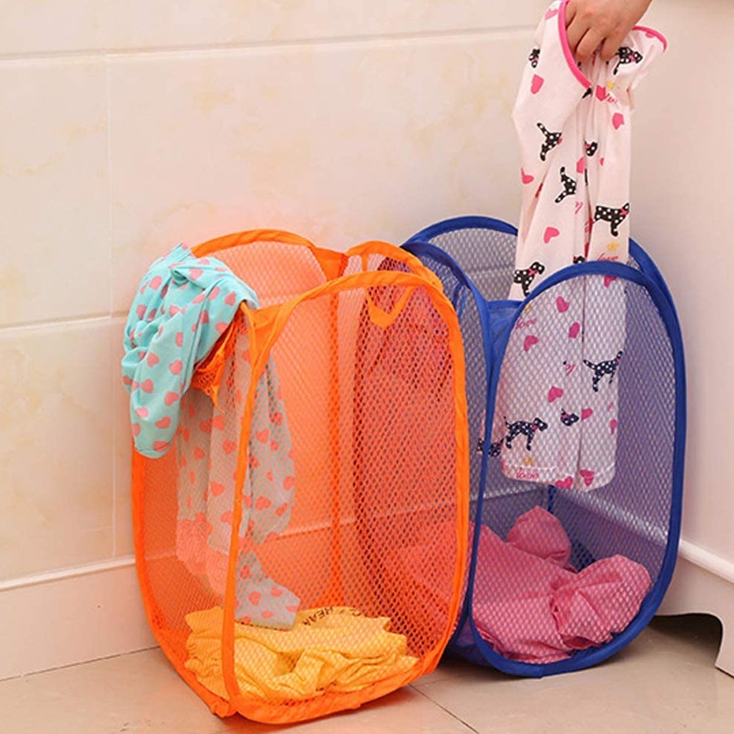 Space-saving foldable laundry basket with durable handles.