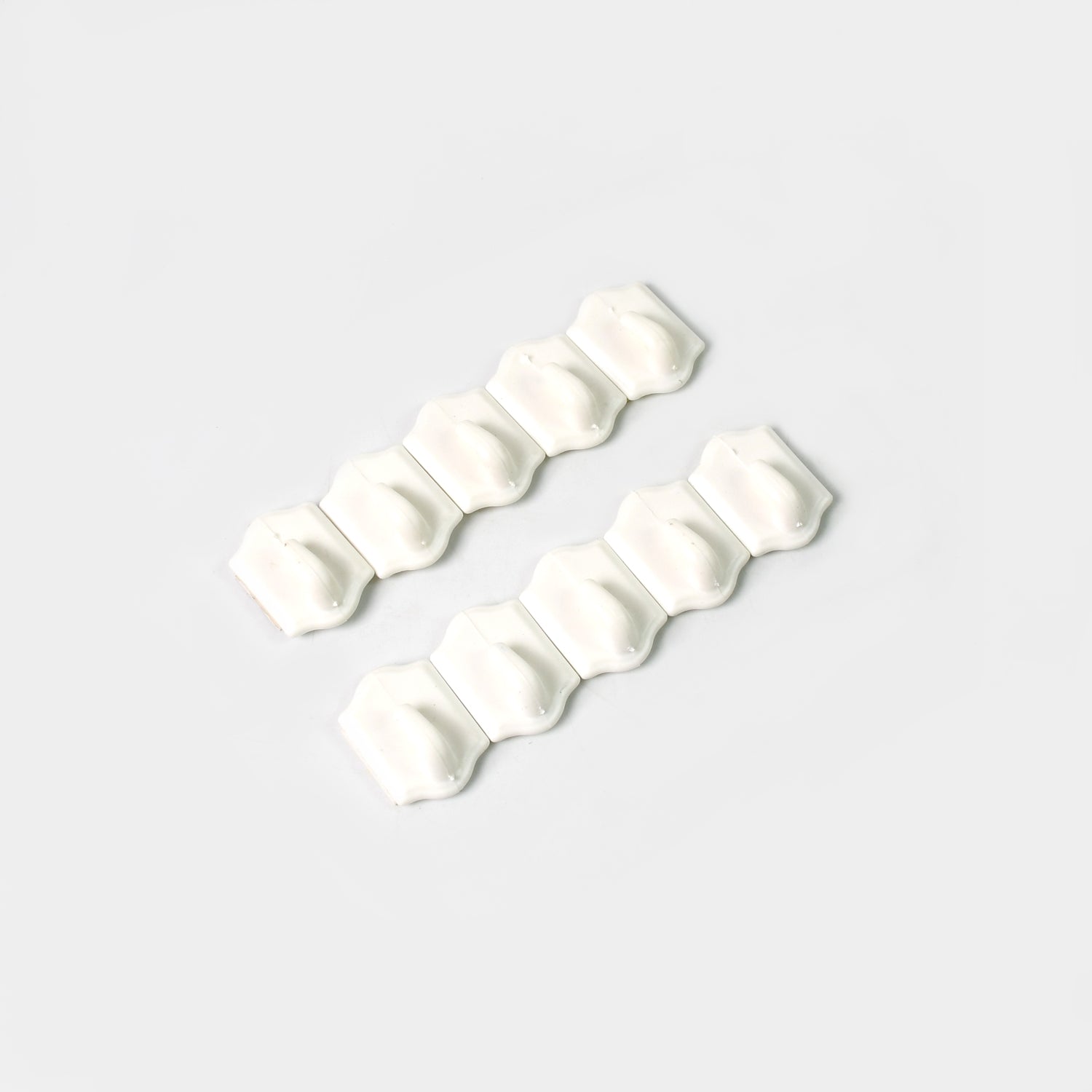 Illustration showing easy peel-and-stick installation steps for the adhesive wall hooks.