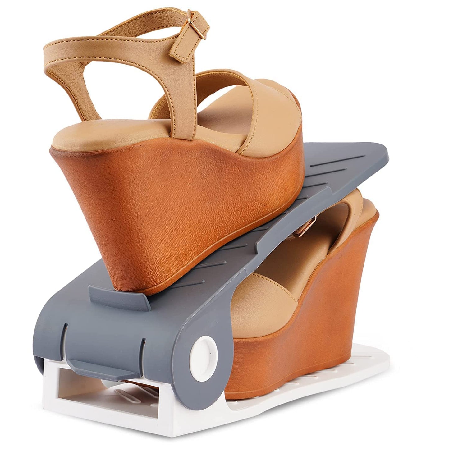 A pair of shoes comfortably placed in an adjustable shoe organizer, ready for compact storage.
