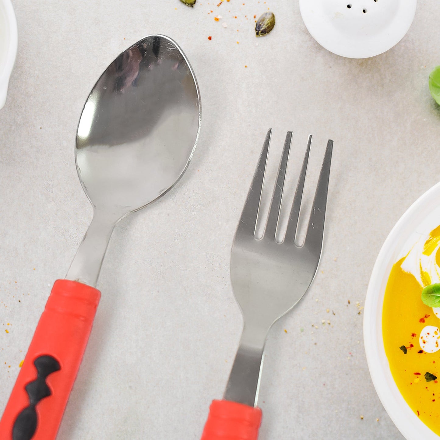 A full view of the Serve Stellar 24-piece flatware set with its stand.