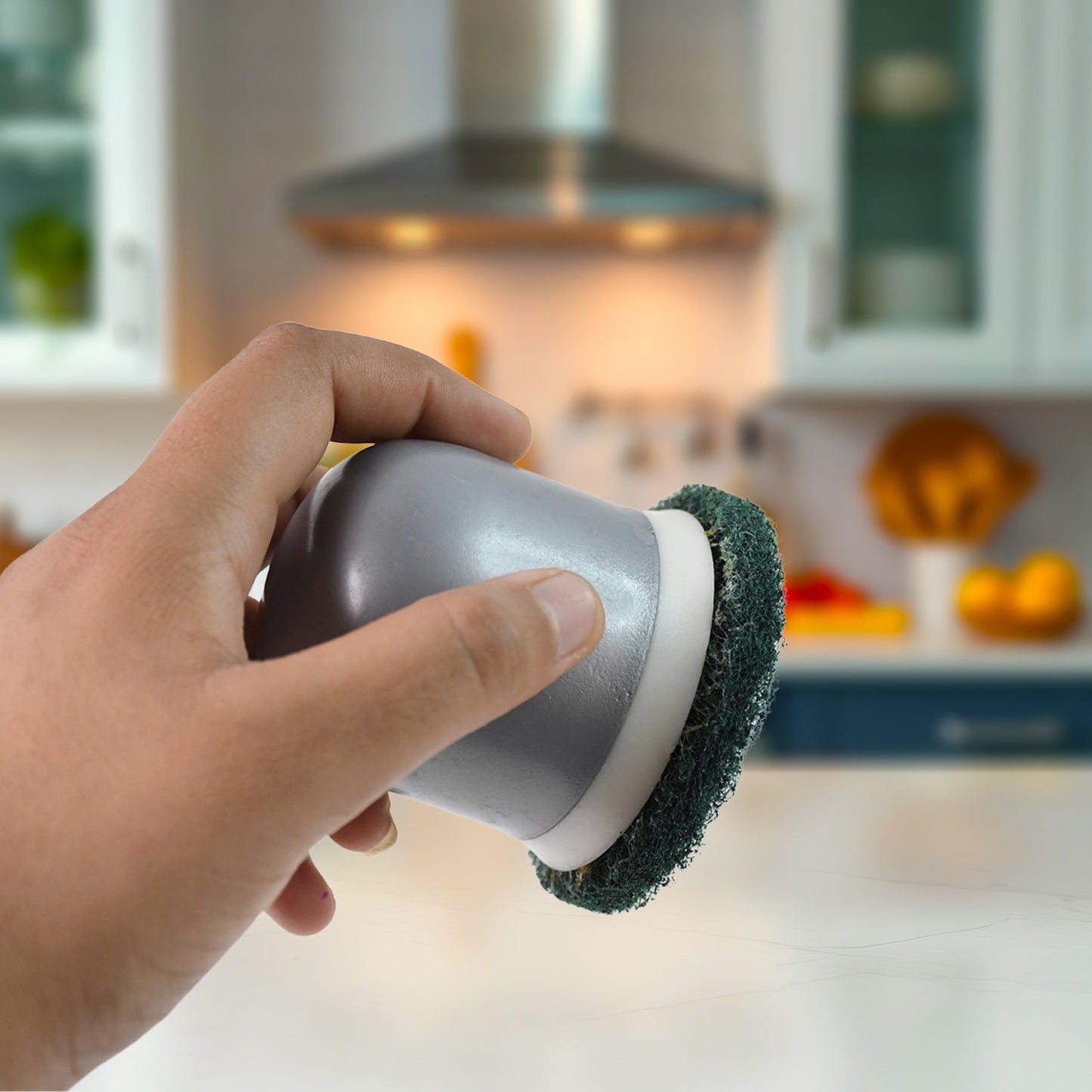 Grease remover scouring pad for kitchen surfaces