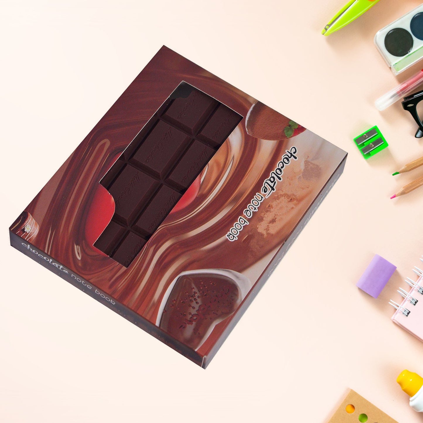 Close-up of the textured cover of the bite-shape chocolate scented diary.