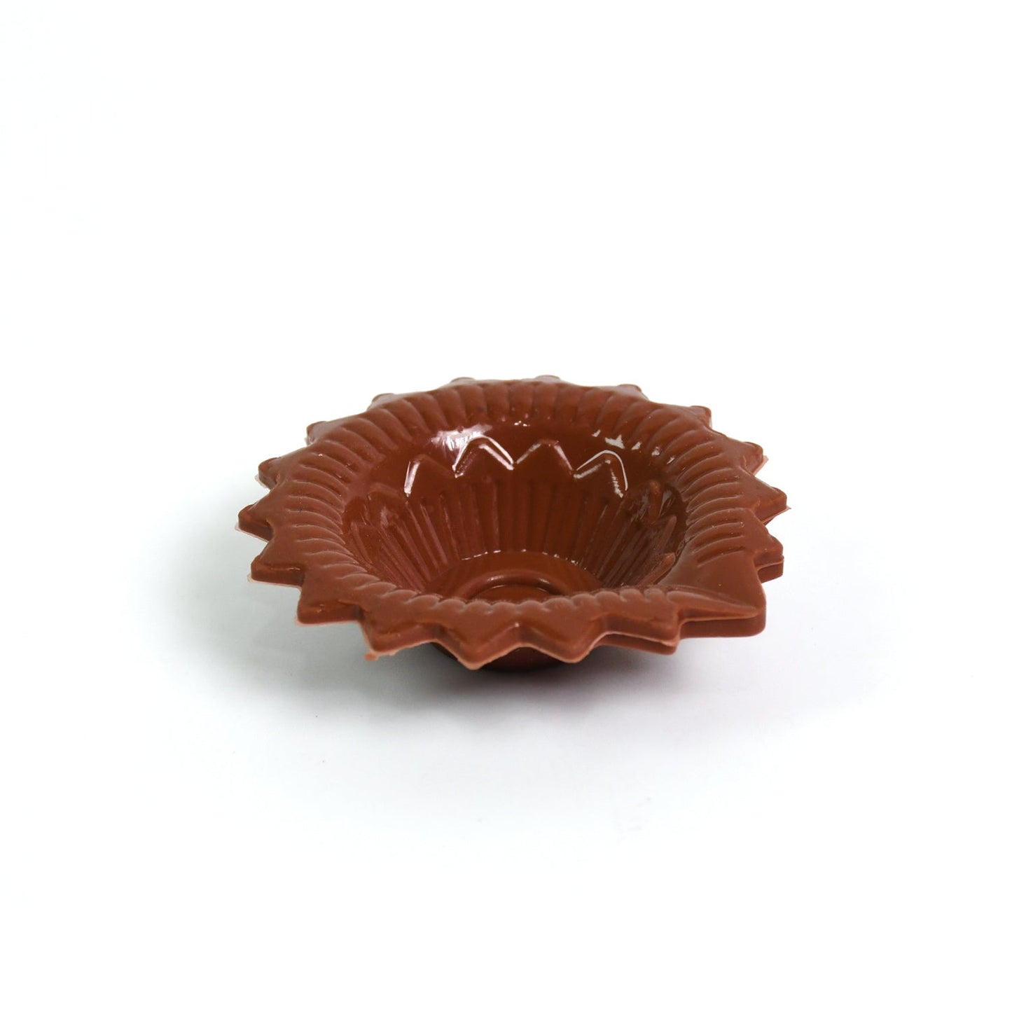 A single, beautifully crafted colourful silicone diya ready for festive lighting on Diwali.