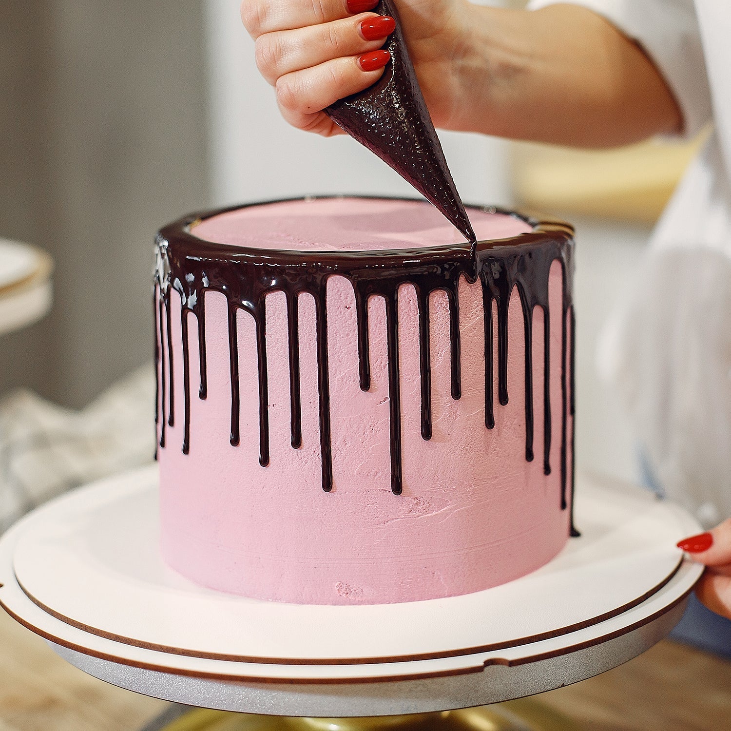 An array of stainless steel nozzles and a clear disposable piping bag for frosting.